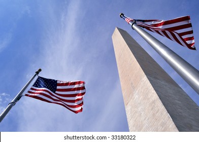 American Flags Surrounding The Washington Memorial On The National Mall In Washington DC.