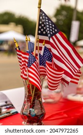 American flags in a vase during Open Streets ICT in Wichita, KS