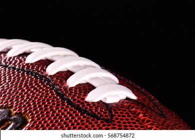  American Football Ball Close Up On Black Background