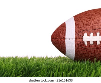 American Football. Ball On Green Grass, Isolated On White