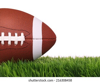 American Football. Ball On Green Grass, Isolated On White