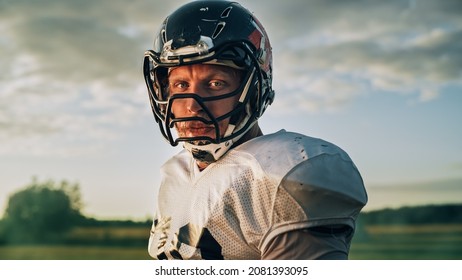 American Football Championship Game: Portrait of Professional Player, Wearing Helmet, Turning Around and Looking at Camera Dramatically. Professional Athlete Determined to Win. - Powered by Shutterstock