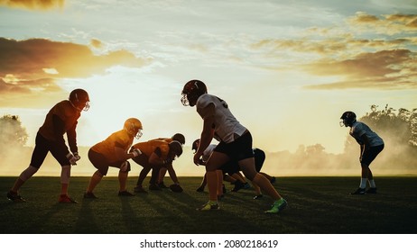 American Football Field Two Teams Compete: Players Pass And Run Attacking To Score Touchdown Points. Professional Athletes Fight For The Ball, Tackle. Dramatic Golden Hour