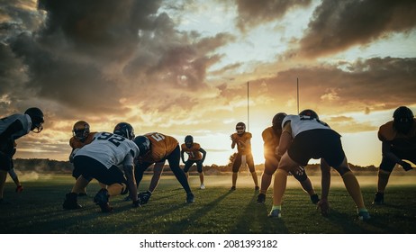 American Football Field Two Teams Compete: Players Pass and Run Attacking to Score Touchdown Points. Professional Athletes Fight for the Ball, Tackle. Dramatic Golden Hour Shot
