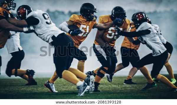 American Football Field Two Teams Compete:\
Successful Player Run Around Defense to Score Touchdown Points.\
Professional Athletes Compete for the Ball, Tackle, Fight for\
Championship Victory