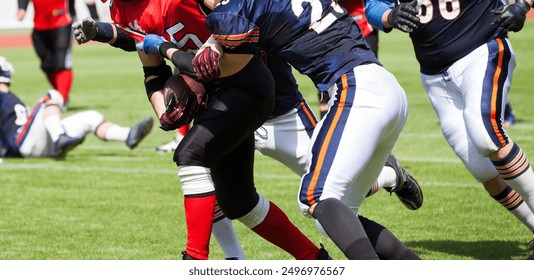 American football game - players in action - Powered by Shutterstock