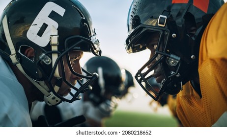 American Football Game Start Teams Ready: Close-up Portrait Of Two Professional Players, Aggressive Face-off. Competitive Warriors Full Of Brutal Energy, Power, Skill. Dramatic Stare.