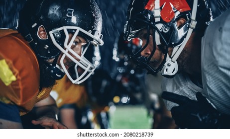 American Football Game Start Teams Ready: Close-up Portrait Of Two Professional Players, Aggressive Face-off. Competition Full Of Brutal Energy, Power, Skill. Rainy Night With Dramatic Light