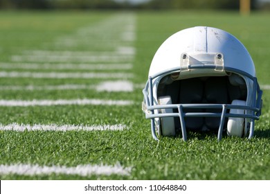 American Football Helmet On The Field With Room For Copy