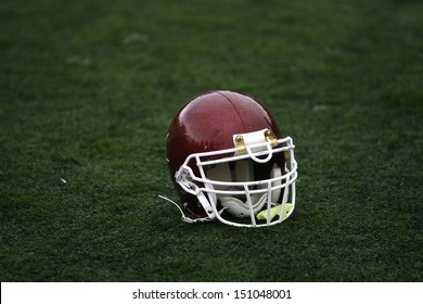 American Football Helmet On The Field