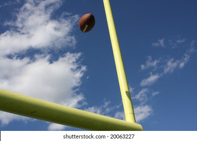 American Football Kicked Through The Goal