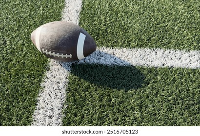 American football on green grass background. Team sport concept - Powered by Shutterstock