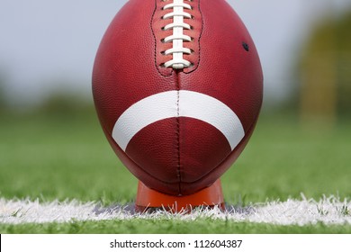 American Football on a Tee ready for kickoff - Powered by Shutterstock