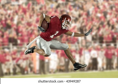 American Football Player In Action With Ball