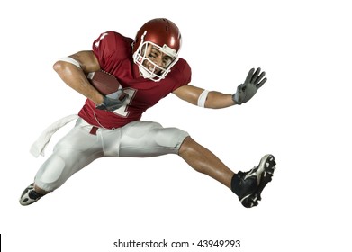 American football player in action with ball - Powered by Shutterstock