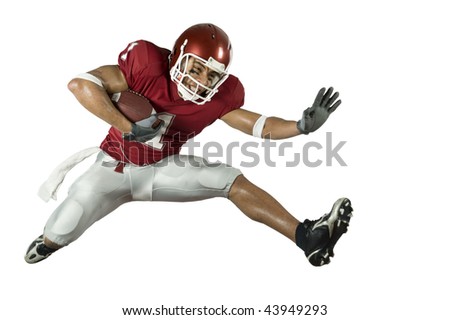 American football player in action with ball