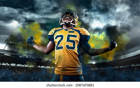 American football player, athlete in helmet with ball on stadium. Sport wallpaper with copyspace.