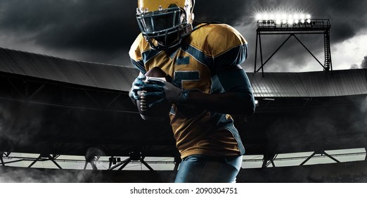 American Football Player, Athlete In Helmet With Ball On Stadium. Sport Wallpaper With Copyspace.