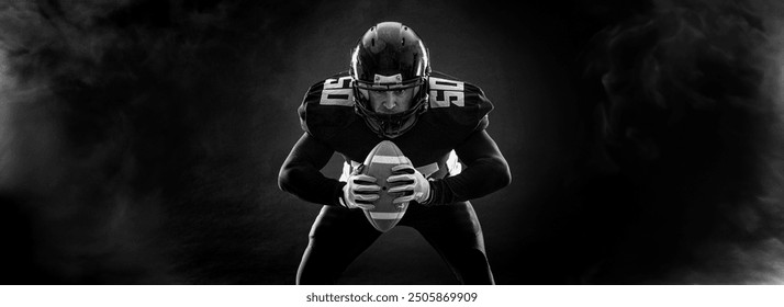 American football player banner on black background. Template for sports ads with copy space. Black and white photo - Powered by Shutterstock