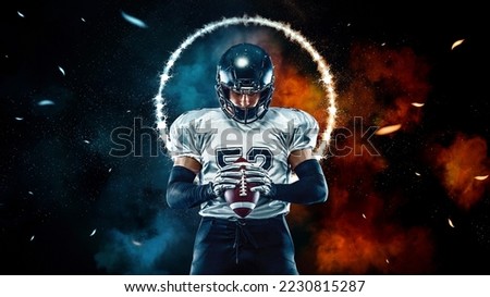 American football player black background with fire