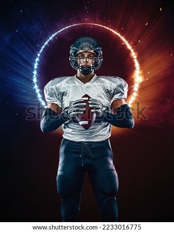 American football player black background with fire