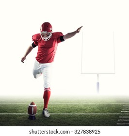 American football player kicking football against american football posts - Powered by Shutterstock