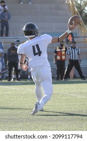 American Football Player. Quarterback Throwing  The Ball