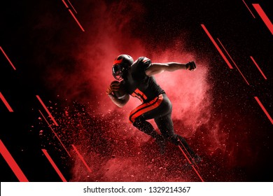 American football player in red smoke.