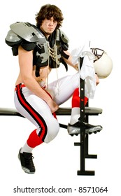 American Football Player. Seated On Weight Bench.