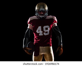 American Football Player. Sportsman With Ball In Helmet On Stadium In Action. Sport Wallpaper. Team Sports.