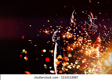 American football player standing in rugby helmet against firework bursting sparkle background - Shutterstock ID 1514153087