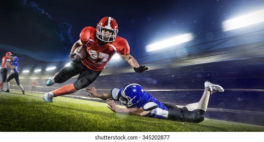 american football players in the action grand arena