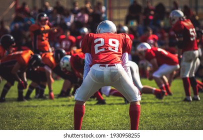 american football players during a game - Powered by Shutterstock