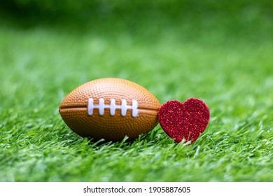 American football with red heart for Valentine's Day concept