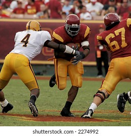 American Football Running Back Crosses The Line