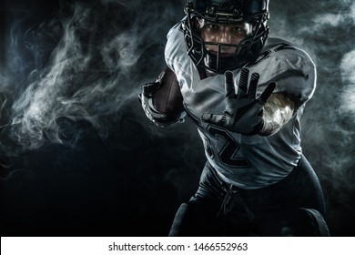 American Football Sportsman Player In Helmet On Stadium. Sport Wallpaper.