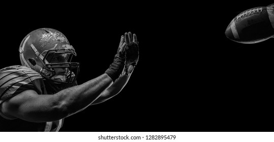 American football sportsman player isolated on black background - Powered by Shutterstock