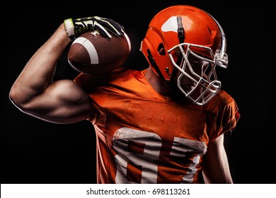 American Football Sportsman Player On Black Background