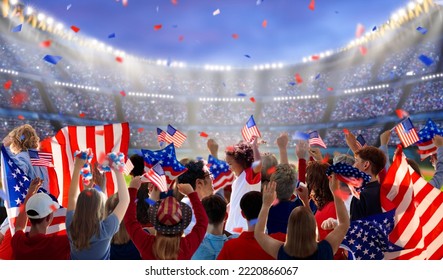 American Football Supporter On Stadium. US Fans On Soccer Pitch Watching Team Play. Group Of USA Supporters With Flag And National Jersey Cheering For America. Championship Game.