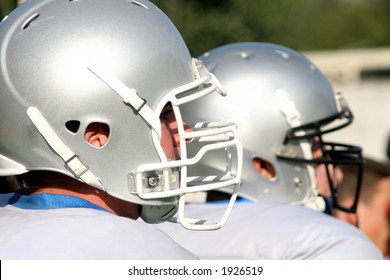 American football, two players with helmets
