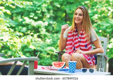 American Girl Hanging Out On The Fourth Of July In Her Backyard