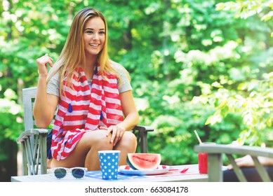 American Girl Hanging Out On The Fourth Of July In Her Backyard