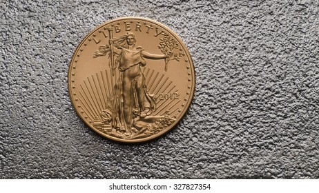 American Gold Eagle Coin On Silver Bar