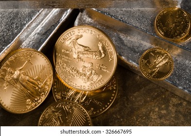 American Gold Eagle Coins With Laying On Silver Bars