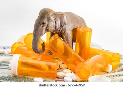 American Health Care Act Or AHCA And The Repeal And Replace Of The Affordable Care Act Or ACA Concept With Elephant Representing The Republican Party, Stuck In A Bunch Of Money And Prescription Pills