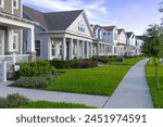 American houses and pedestrian path in summer