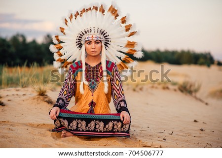 American Indian woman sitting in yoga pose