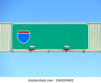 American Interstate Highway Overhead Road Sign. Blue Sky Background