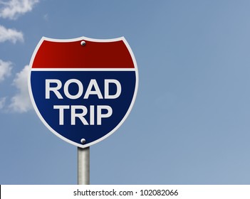 An American Interstate Road Sign With Words Road Trip Over A Sky Background, Taking A Road Trip