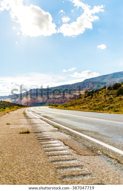 American landscape long endless asphalt north
american mountain road in beautiful sunny autumn weather somewhere
in the USA